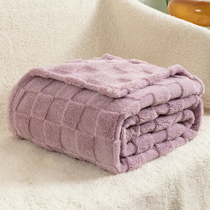Geometric patterned polyester blanket in milky white showing cotton velvet texture and thickened construction