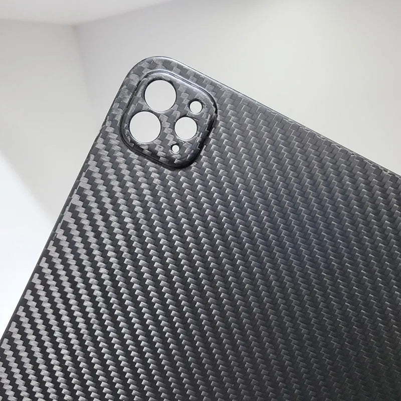Genuine carbon fibre hard protective case for Apple iPad Pro 11 tablet in matte and forged finishes.