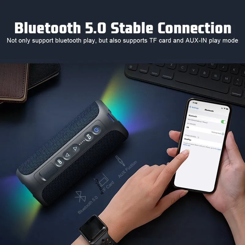 Black and blue fabric wireless Bluetooth speaker with LED lights showing front controls