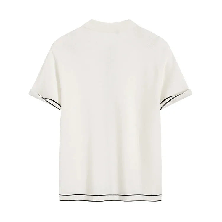 White short sleeve cardigan with contrasting colour lapels on a hanger.