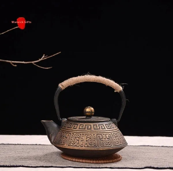 Japanese-style cast iron teapot in a choice of ten patterns, shown in 0.9L size.