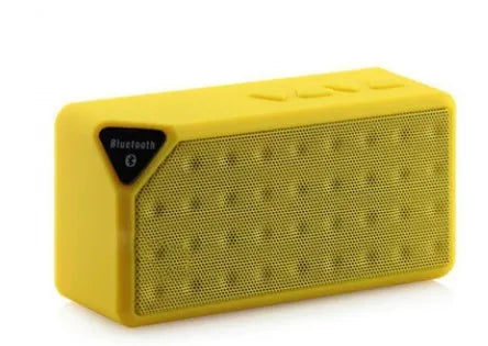 Cannon X3 small portable Bluetooth speaker in black, blue, green, red, or yellow colour with cube subwoofer design