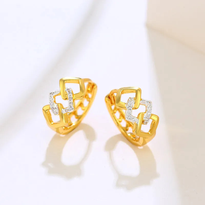 Gold geometric hollow-out clip earrings with colour separation design on alloy metal