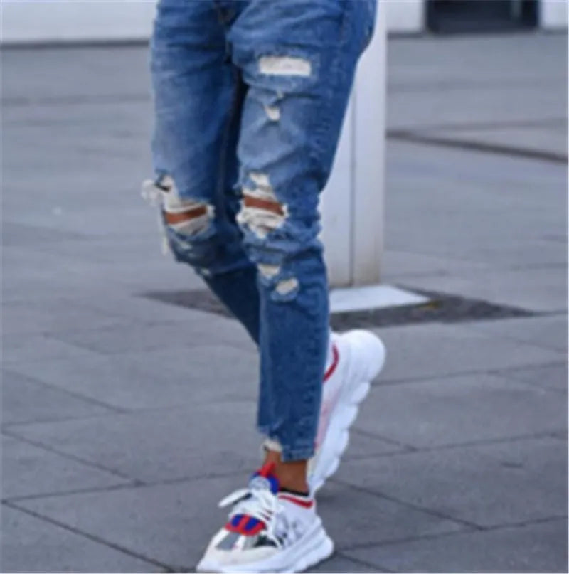 Men's blue cotton jeans with hole detailing showing front and back views