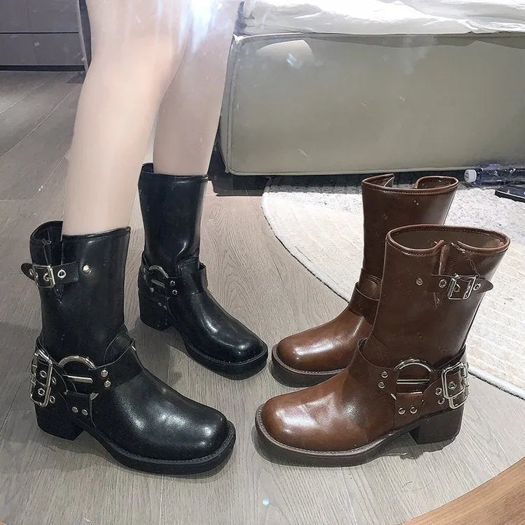 Black platform boot with buckle strap on mid-calf shaft, displayed next to brown version.