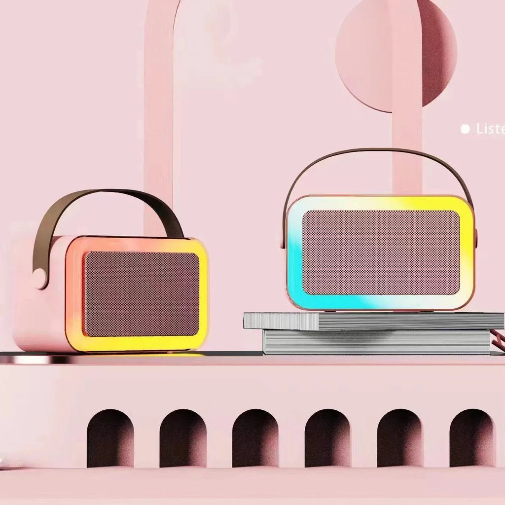 Portable bluetooth microphone speaker in white, pink, or sky blue with karaoke function