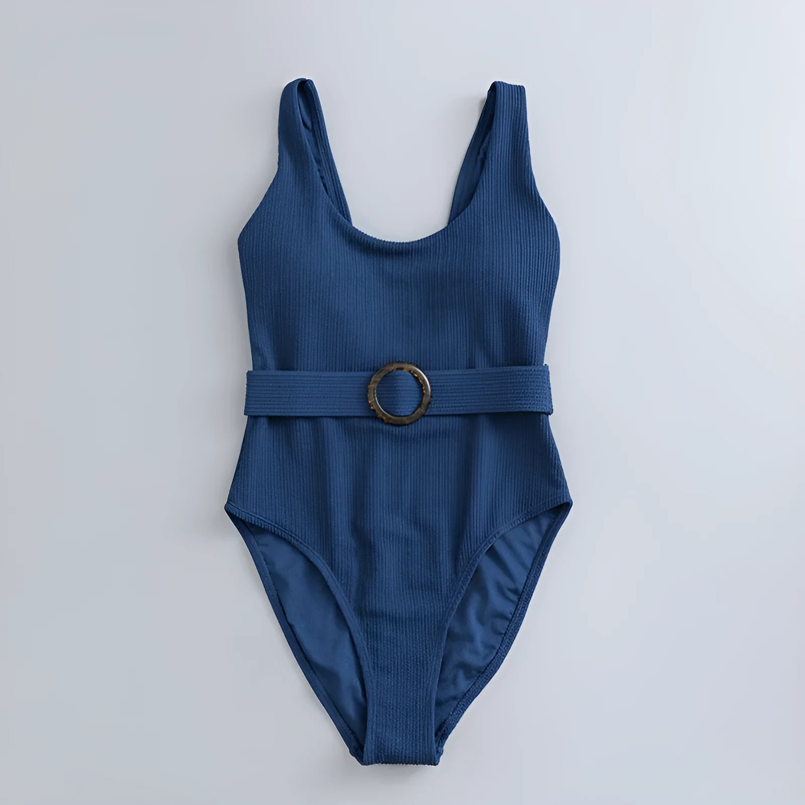 Women's navy blue solid colour one-piece swimsuit with triangle shape and chest pads on a mannequin.