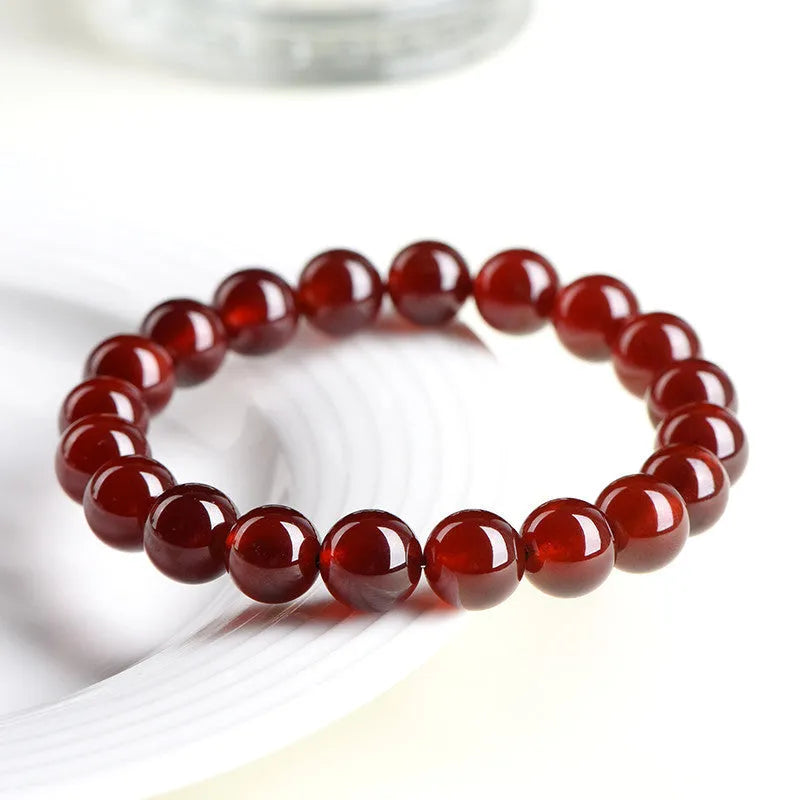 Natural orange red garnet crystal bracelet with Ruyi decorative elements in retro ball design