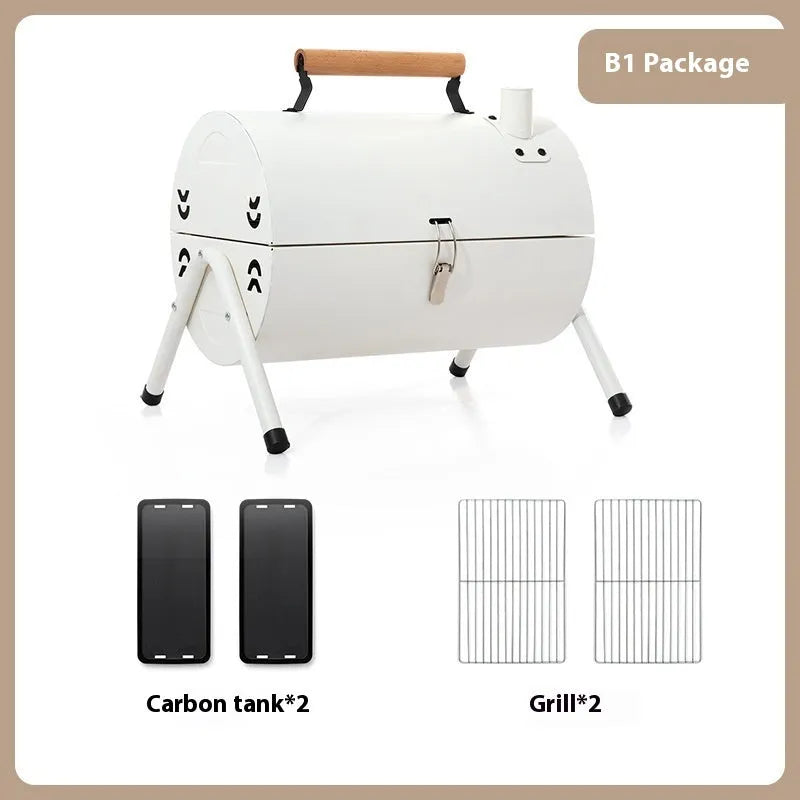 White round portable charcoal grill with chimney oven, grill mesh, and carbon tanks for outdoor cooking.