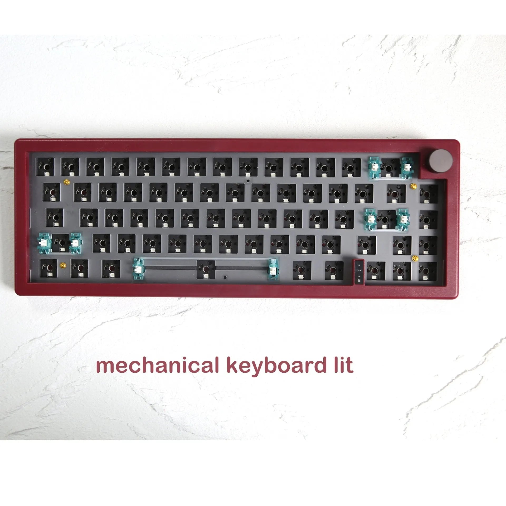 DIY mechanical keyboard kit with RGB lighting in seven colour options showing compact 40cm design