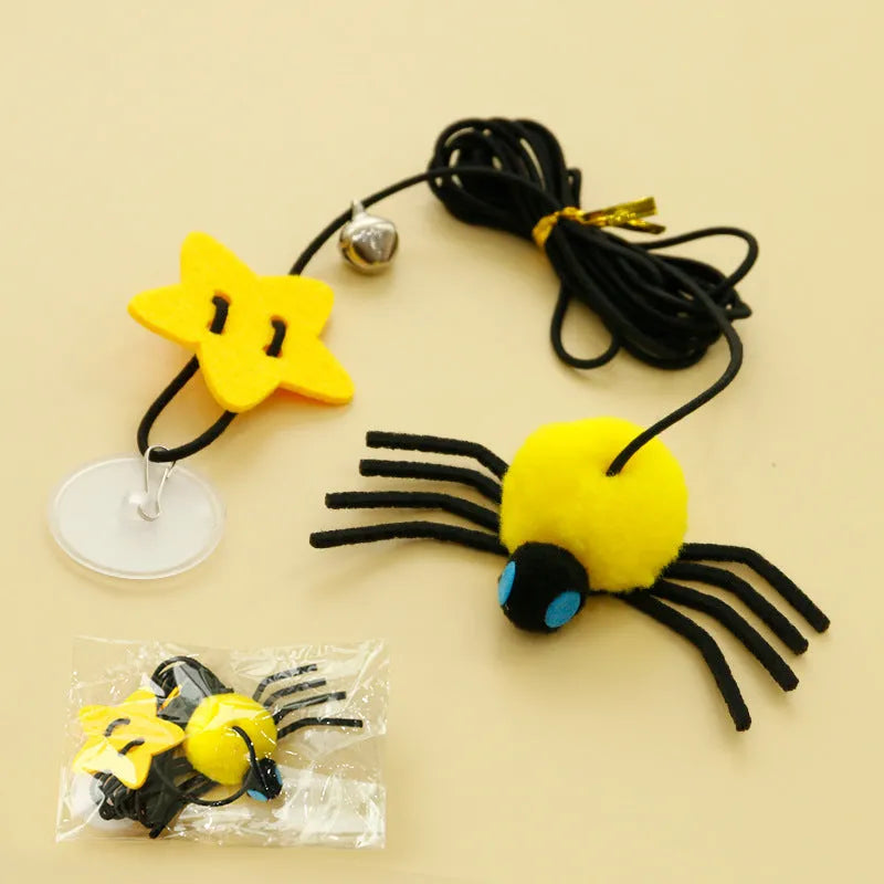 Cat hanging door toy with red feather and bell spider dangling from elastic rope