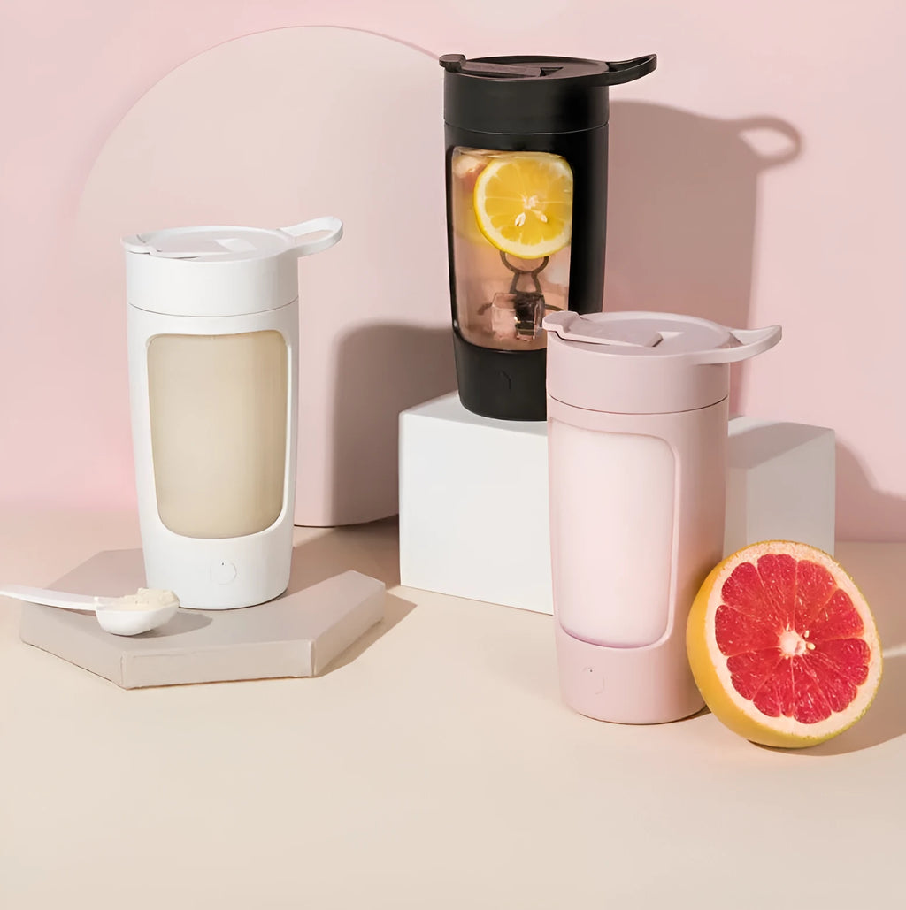 Portable rechargeable blender cup in white, showing cup and motor base, with 650ml capacity mark