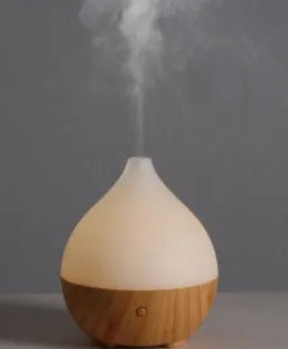 Asakusa wood grain finish vase-shaped ultrasonic aroma diffuser with 100ml water tank capacity.