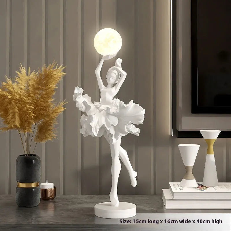 Small modern resin night lamp with USB charging port in black gold colour.