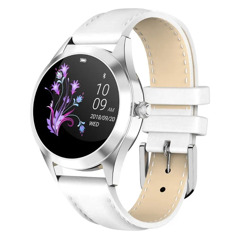 Women's sports smartwatch with colour display showing heart rate monitoring, available in black, rose gold, silver, and white colours