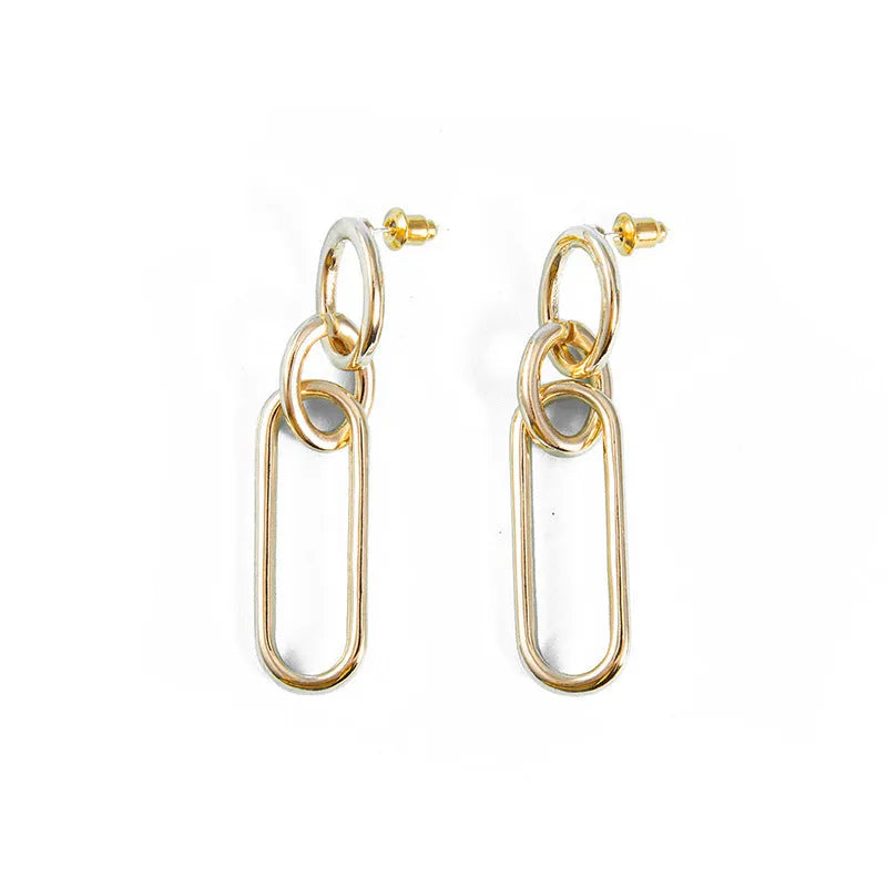 Geometric sterling silver needle hoop earrings with line and ring design elements