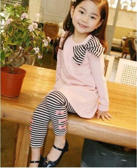 Pink cotton girls clothing set showing complete outfit in measured sizes