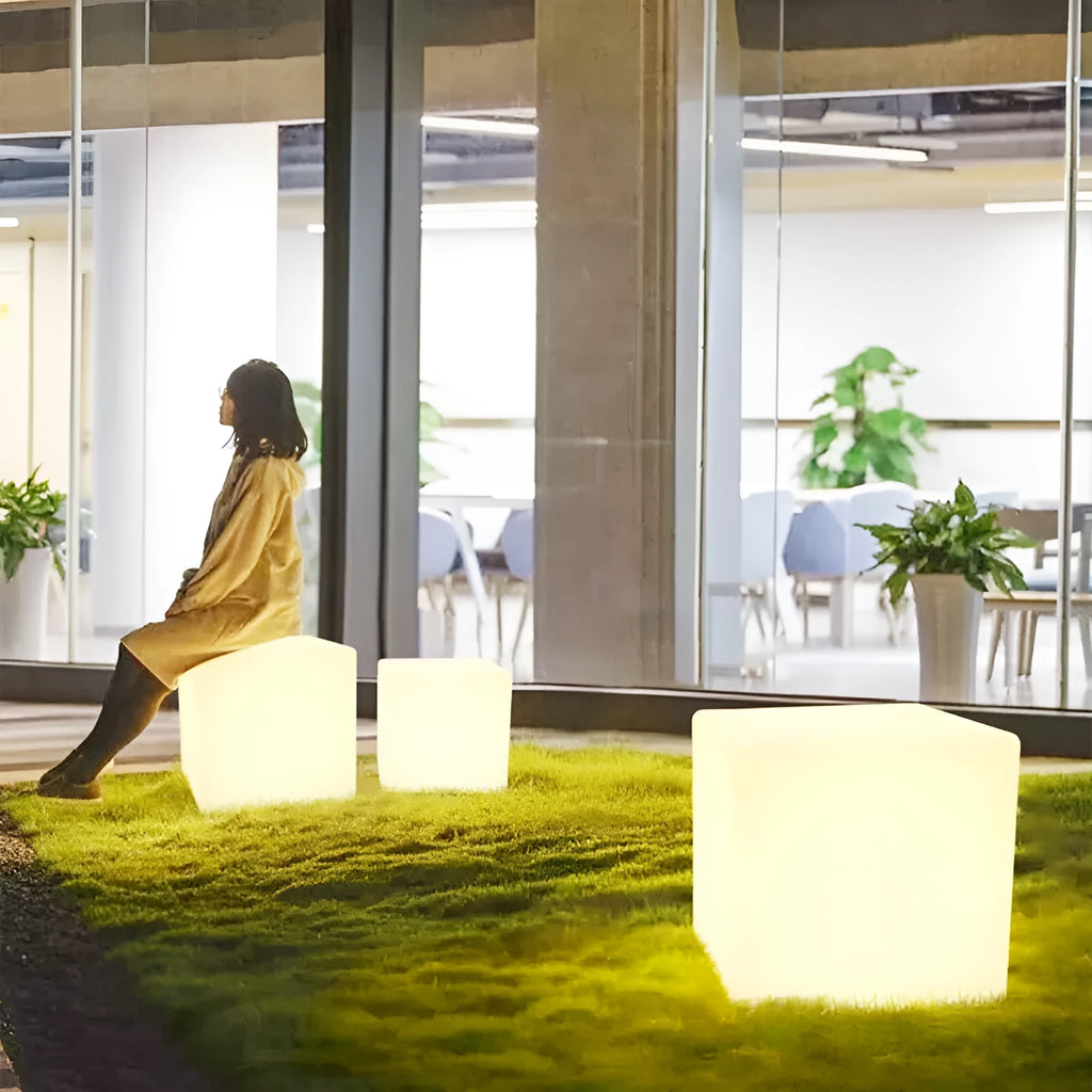 Modern square LED cube light for outdoor garden and patio use with waterproof IP65 rating.