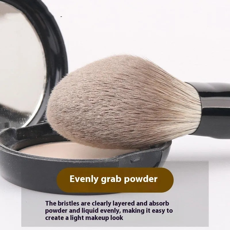 12-piece makeup brush set with wooden handles in a black PU carrying case, including a powder foundation brush.