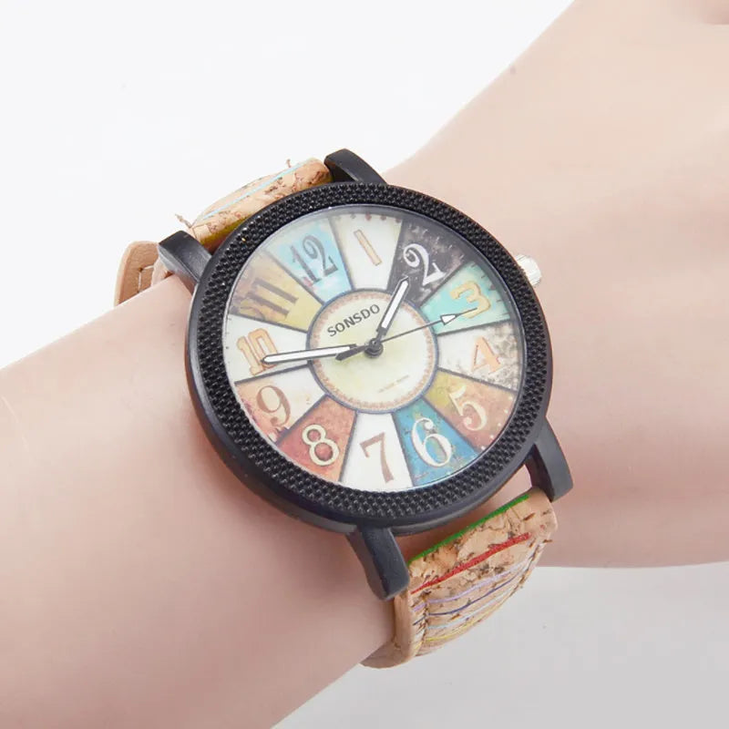 Women's vintage style quartz watch with brown leather strap and 37mm round silver dial