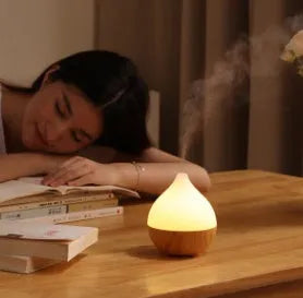 Asakusa wood grain finish vase-shaped ultrasonic aroma diffuser with 100ml water tank capacity.