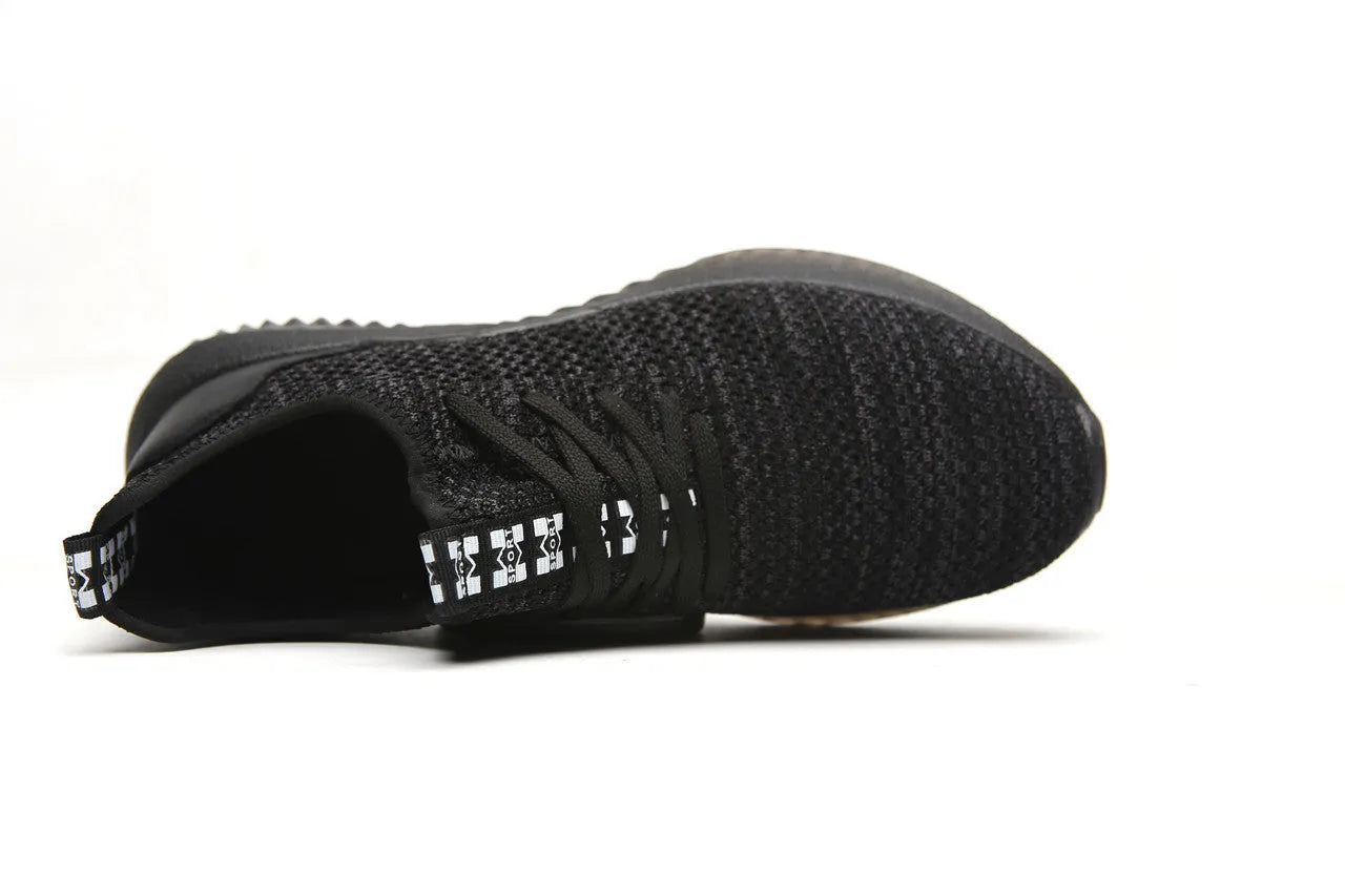 A pair of low-top work safety shoes with a steel toe cap, shown in black, grey, or dark green.