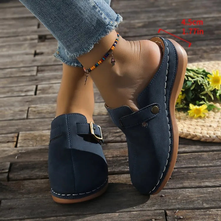 Women's casual wedge slippers in various colours with closed toe design and rubber sole