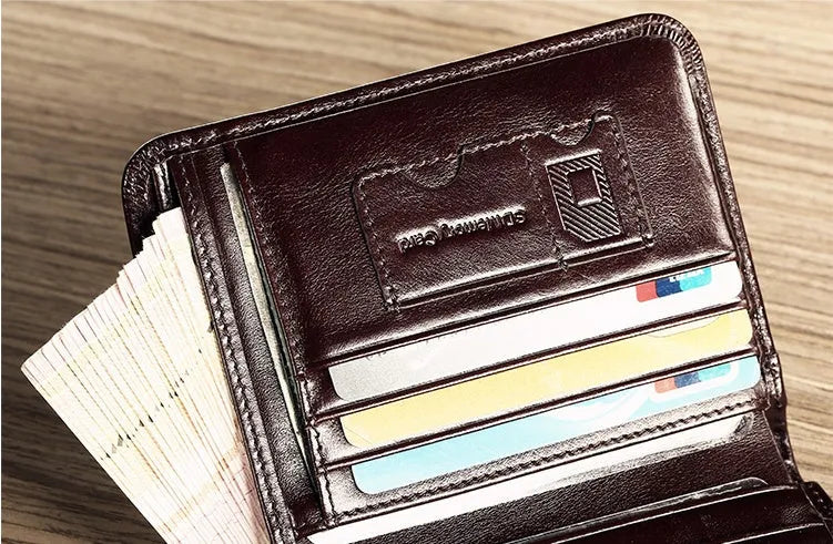 Men's black leather wallet open to show internal compartments: photo slot, card slots, banknote folder, and change pocket.
