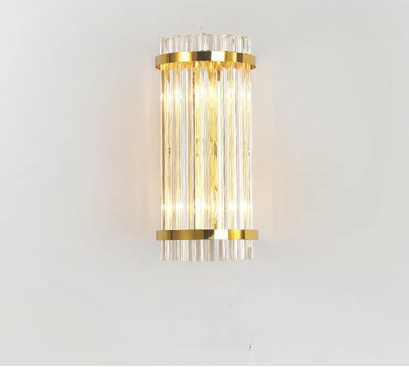 Modern crystal wall lamp with petal design in titanium gold finish