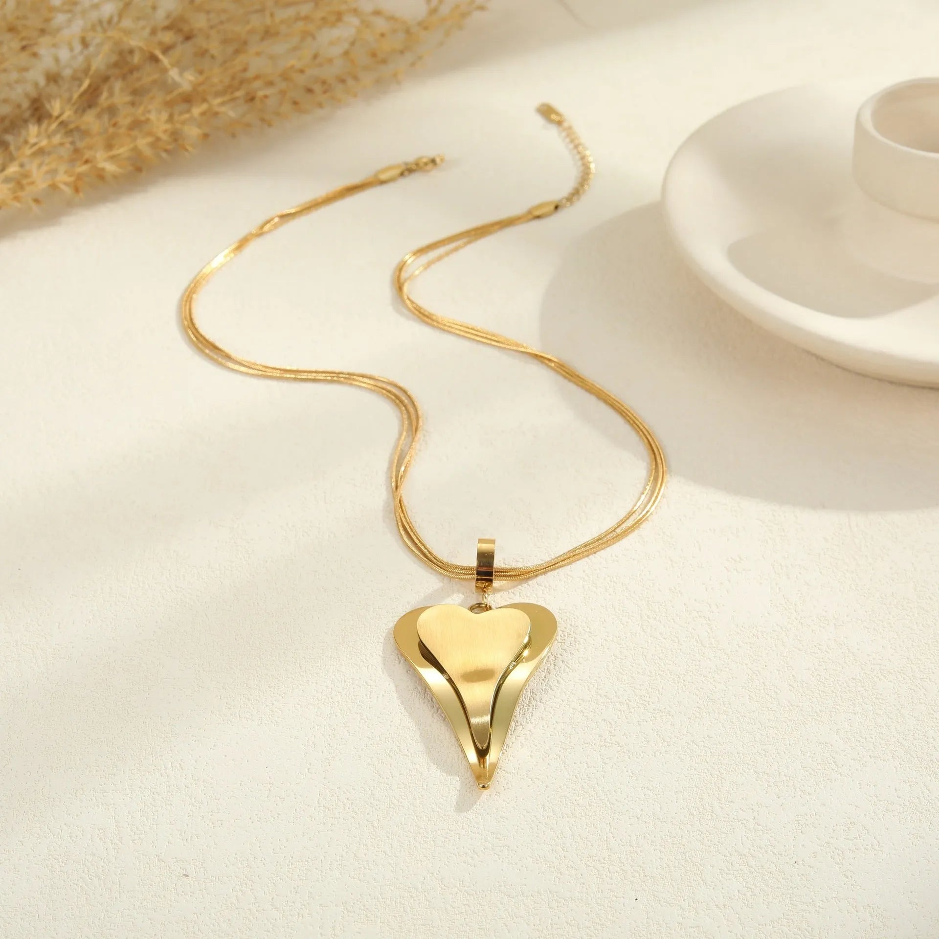 Double heart snake bones geometric pendant necklace in stainless steel with gold or steel finish