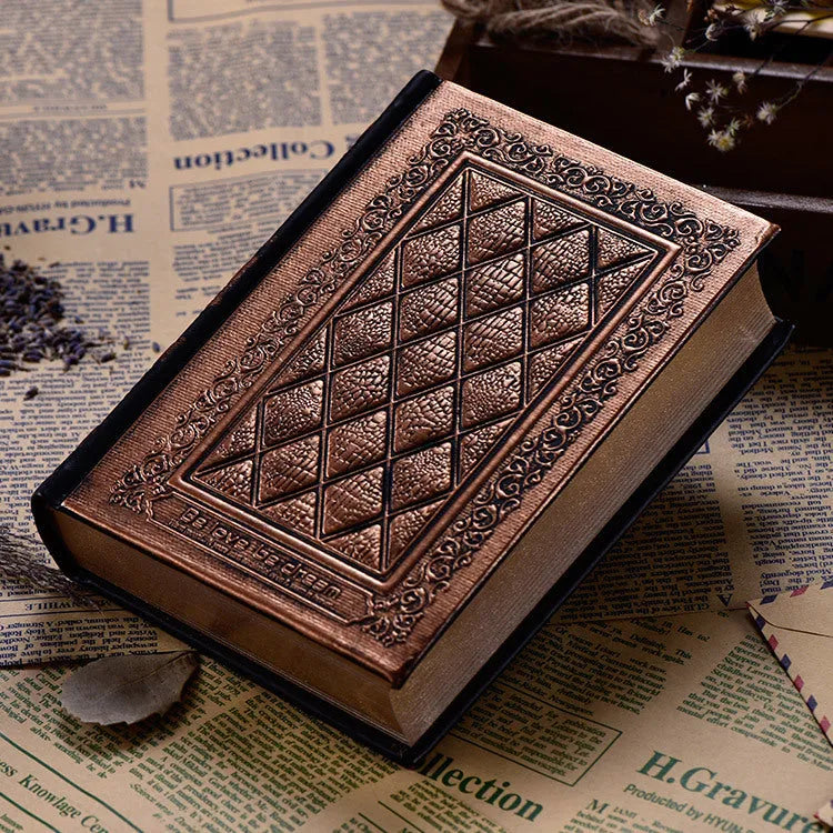 A5 embossed faux leather notebook with a thick cover in bronze or black gold colour.