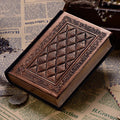 A5 embossed faux leather notebook with a thick cover in bronze or black gold colour.