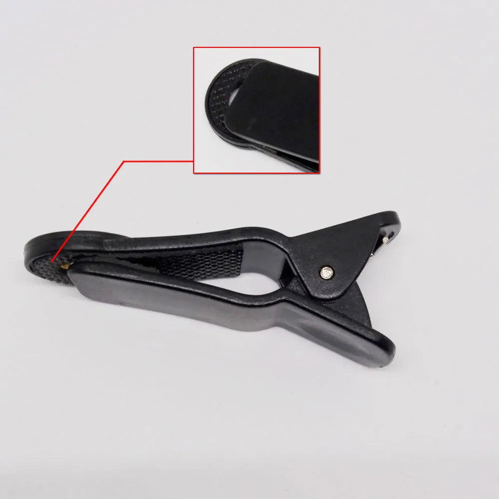 Silver telescopic phone camera lens with clip attachment for smartphones