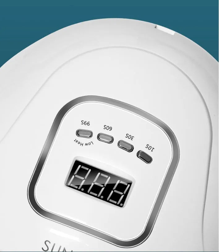 White nail polish curing lamp with UV and LED light sources for gel manicures