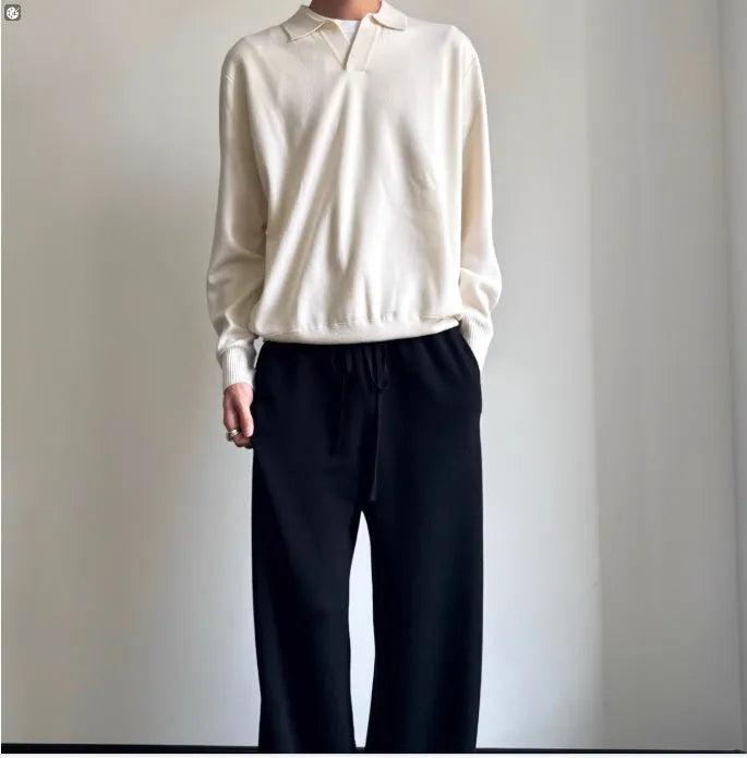 Pure wool POLO sweater with lapel collar in loose fit, shown in milky white and navy blue colour options