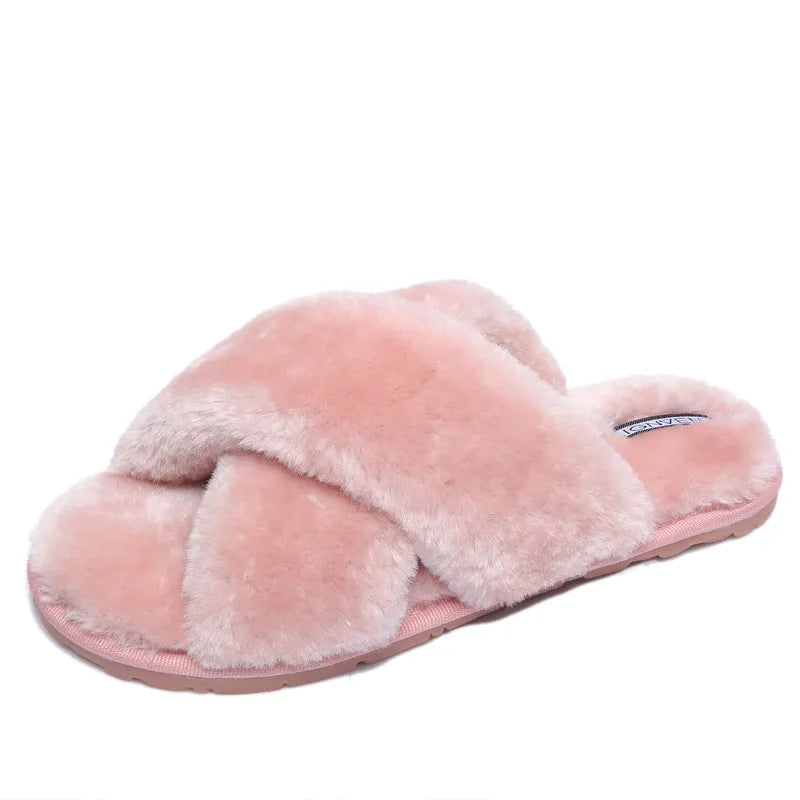Cross strap open-toe fur slippers in multiple colours on a non-slip rubber sole.