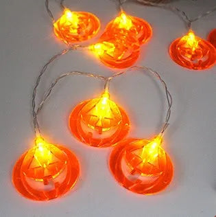 Halloween LED string lights with pumpkin, ghost, and bat pendants in multi-colour light mode