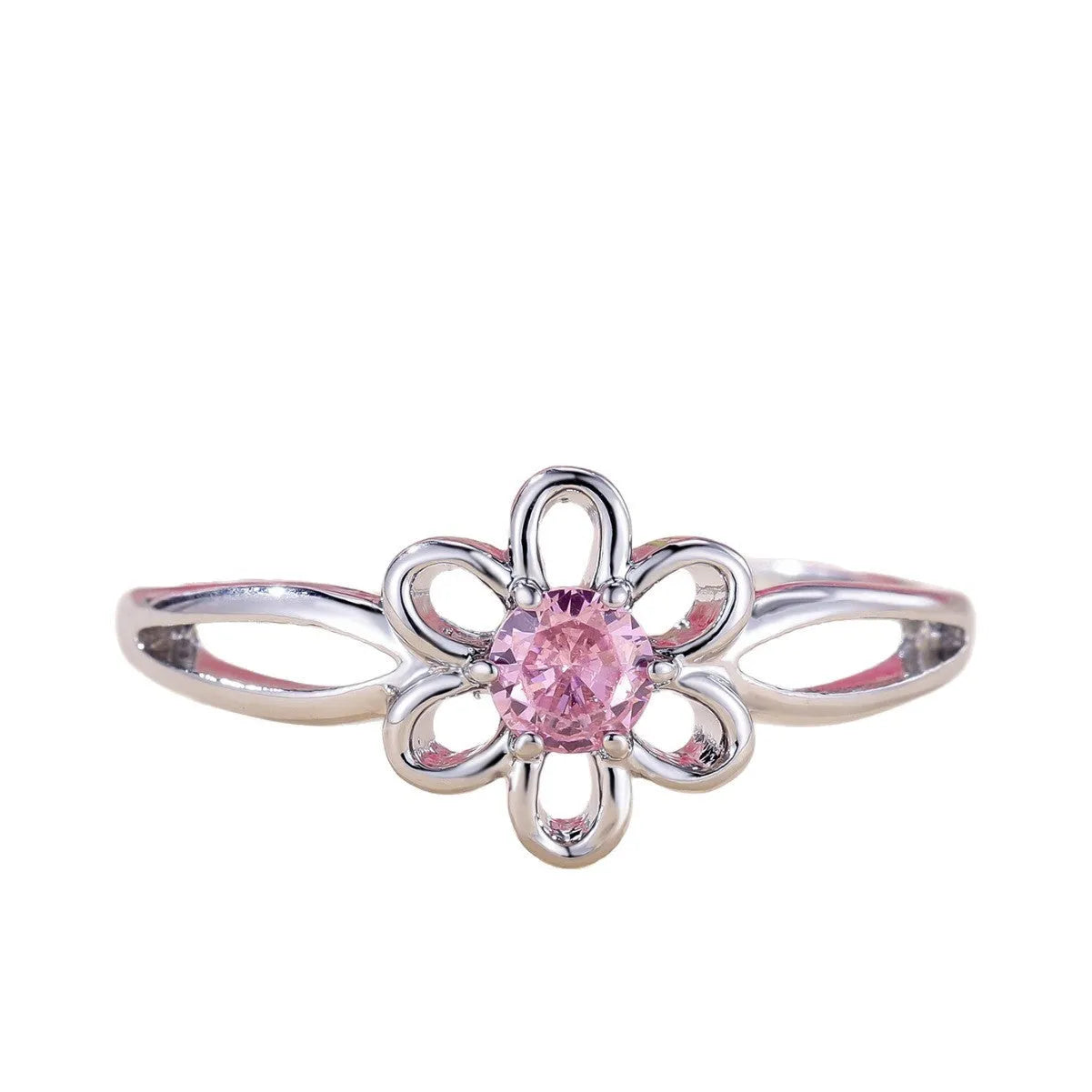 Copper flower hollow-out fashion ring for women with platinum pink diamond plating.