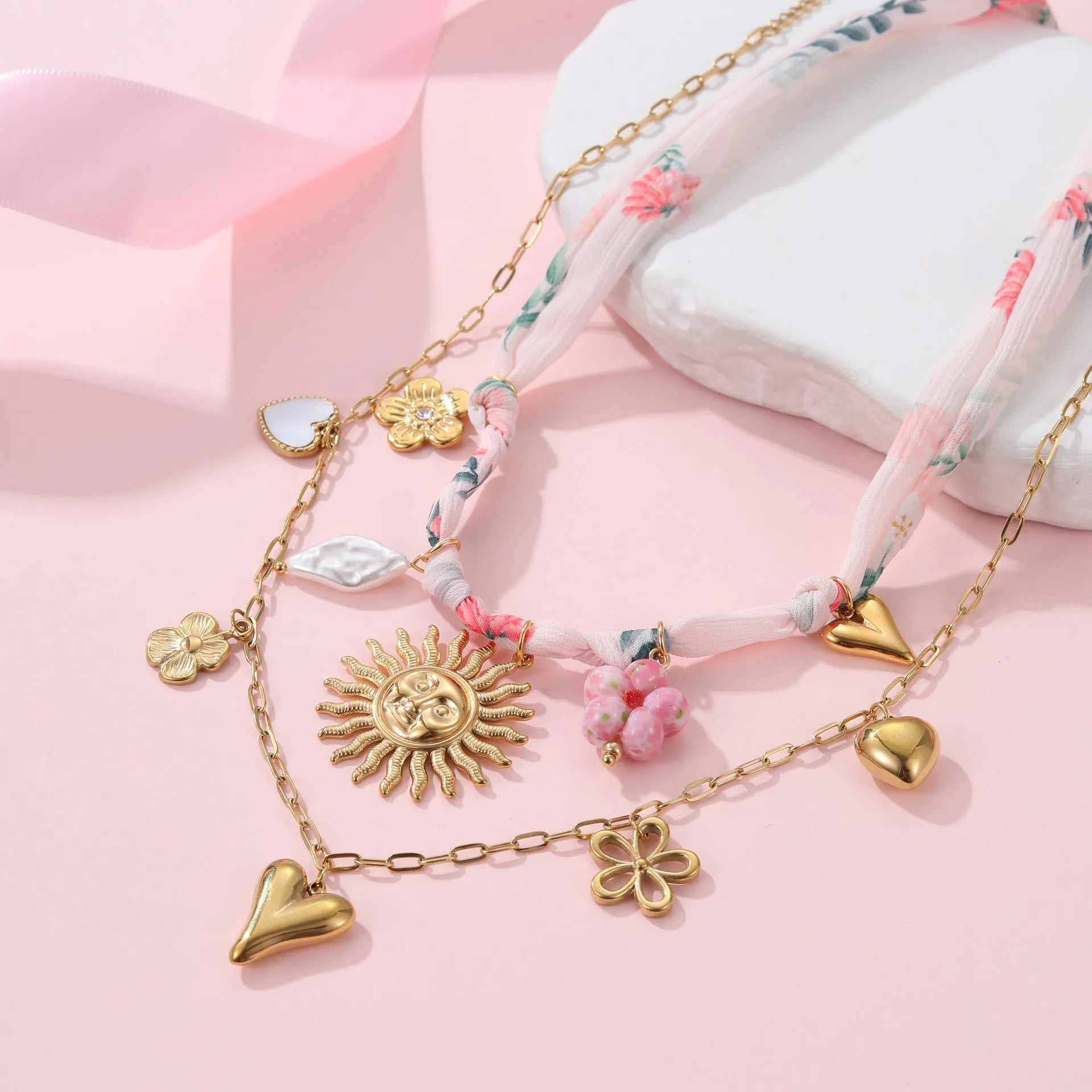Stainless steel necklace with geometric sun pendant on adjustable 41-50cm chain, 18K electroplated finish