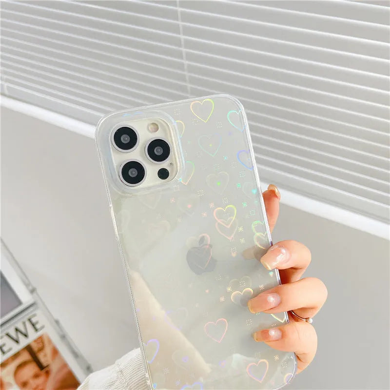 Transparent silicone iPhone case with a colourful laser love heart design.