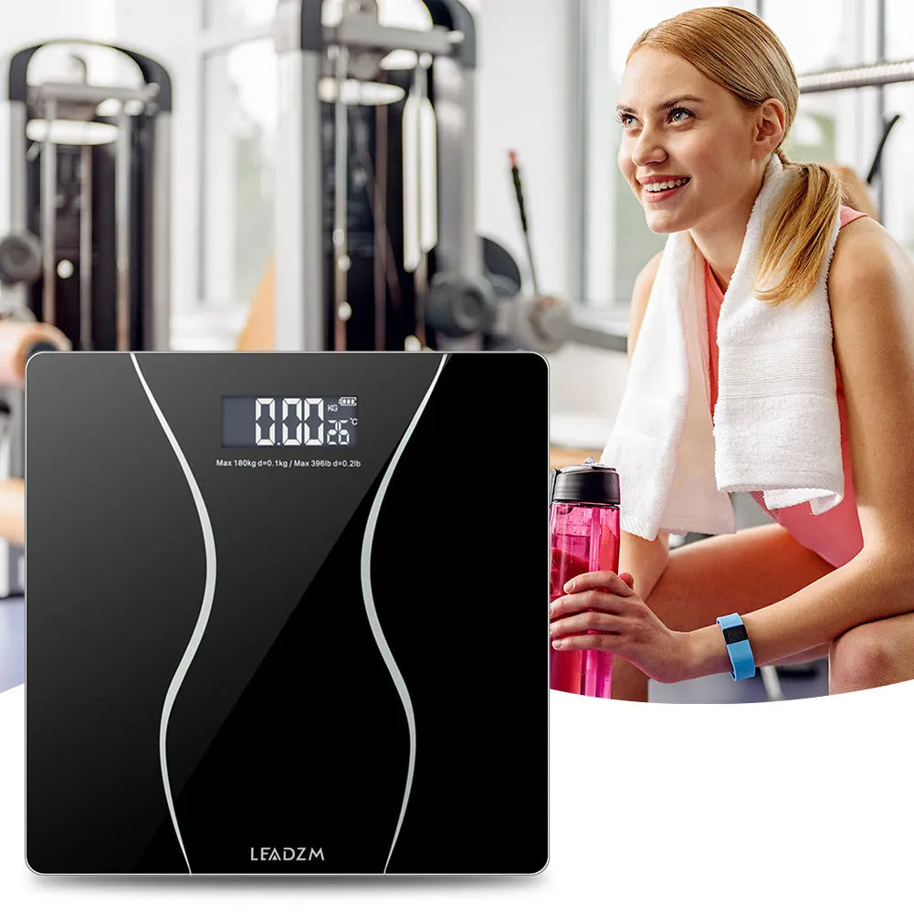 Black electronic body scale with digital display for personal weight measurement up to 180kg