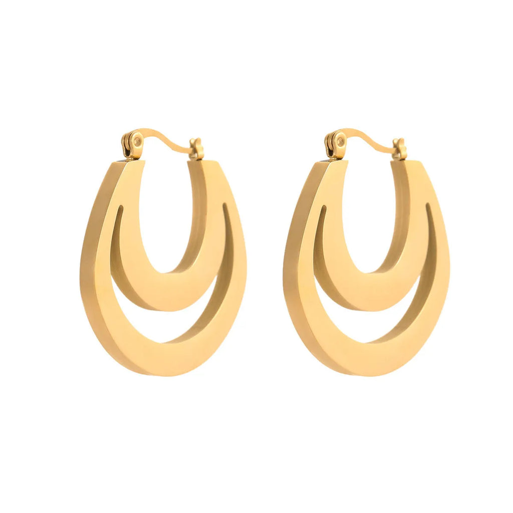 Geometric gold plated hoop earrings with round ring design on stainless steel background
