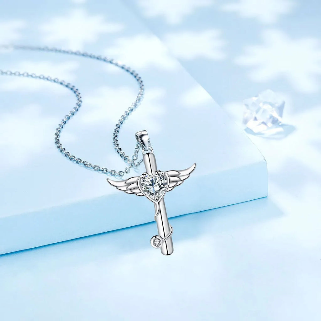 Sterling silver electroplated cross stethoscope necklace with wing design pendant and diamond crystals