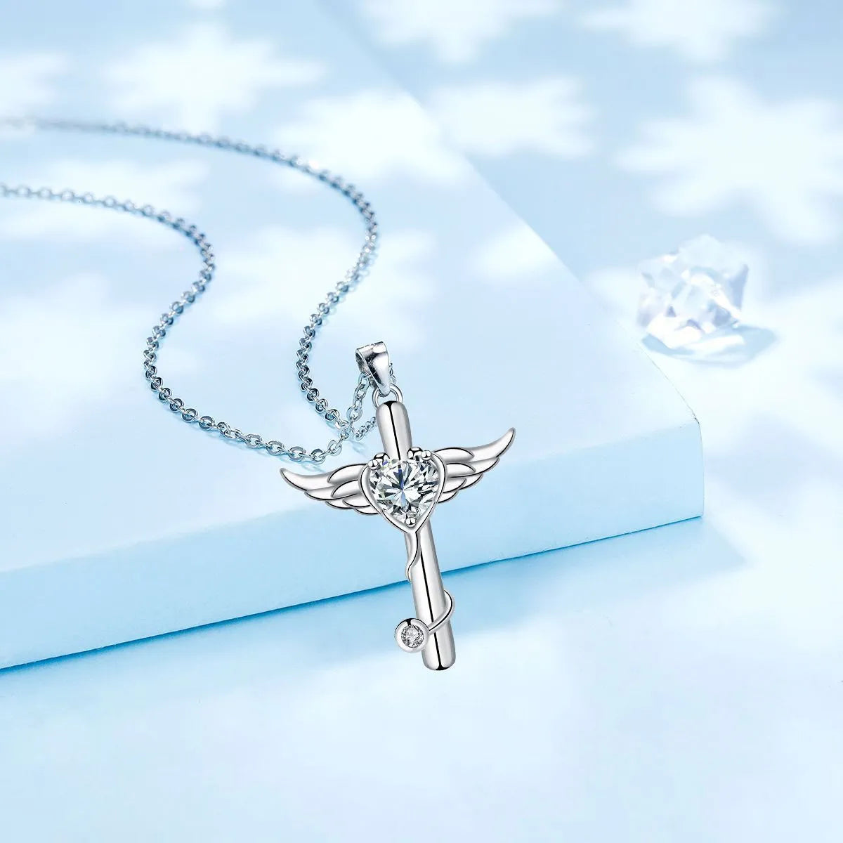Sterling silver electroplated cross stethoscope necklace with wing design pendant and diamond crystals