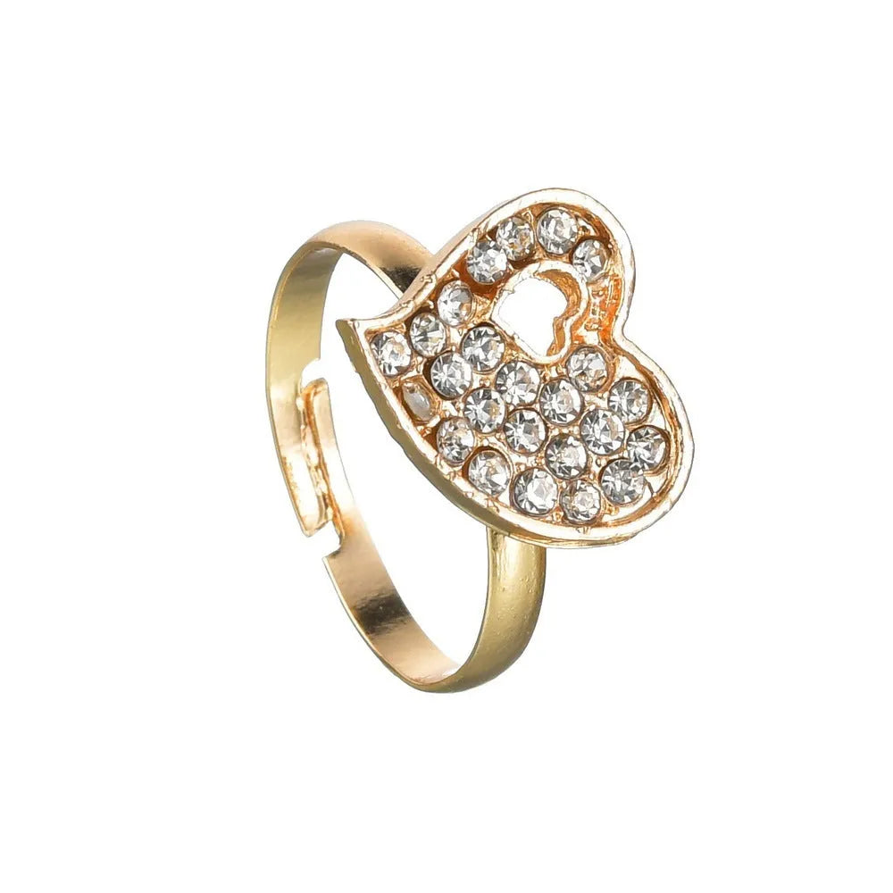 Gold-colour women's jewellery set with earrings, adjustable necklace and bracelet featuring heart, water drop and bell charms.