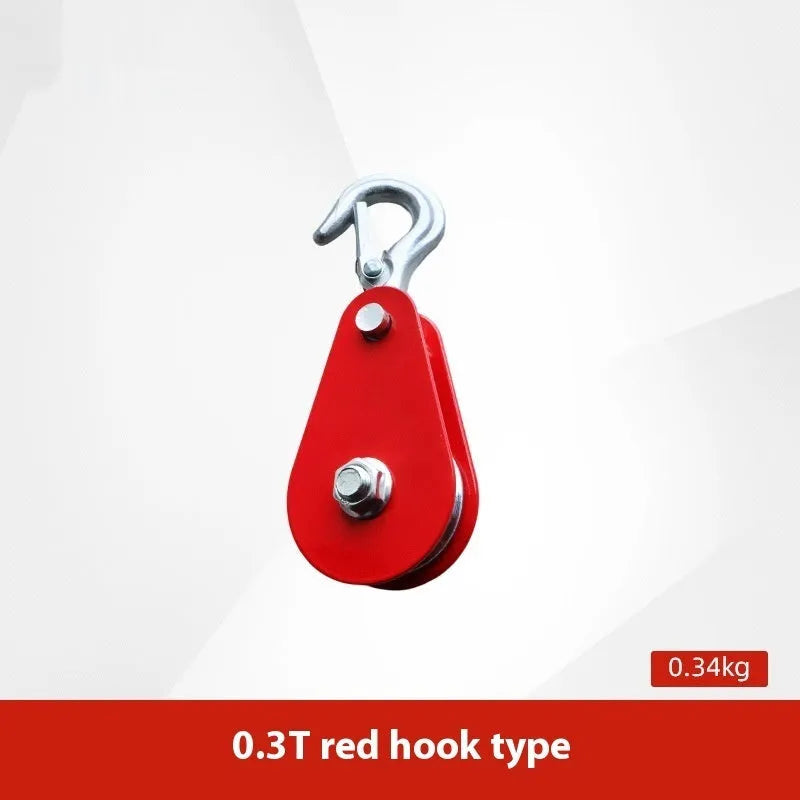 Red forged steel lifting pulley with a safety latch on the hook, for industrial wire rope use.