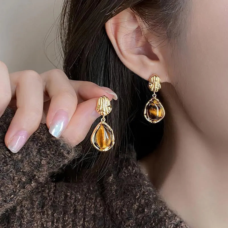 Three pairs of handmade geometric alloy earrings with electroplated finish and tassel elements
