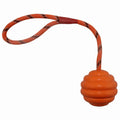 Multi-colour rubber dog toy ball with rope knot design measuring 6×30 cm