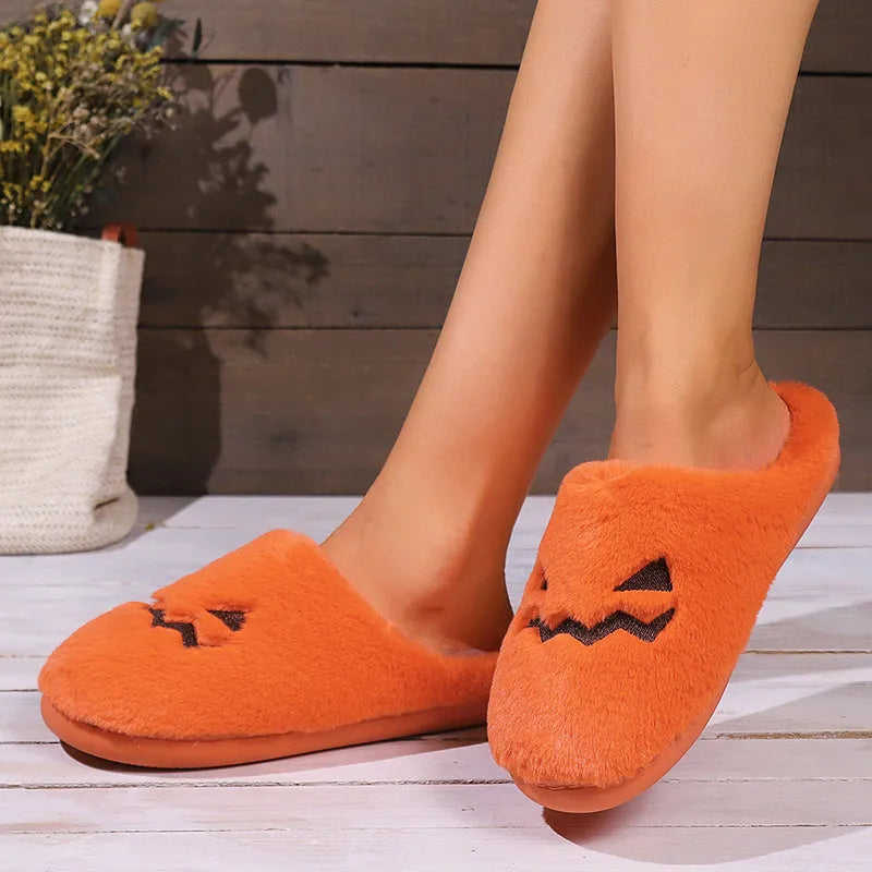 Orange Halloween pumpkin slippers with coral velvet upper and plush lining