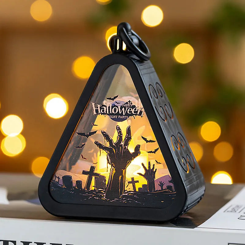 Portable Halloween pumpkin lamp decoration in four colours measuring 8.9 by 5.2 by 11.5 centimetres